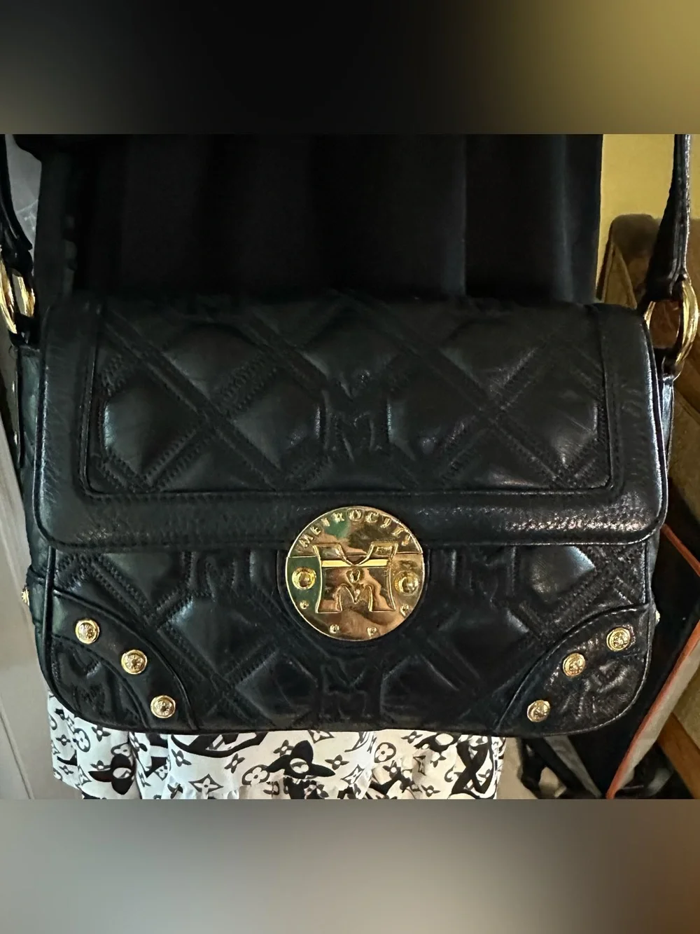 Metrocity Black Quilted Leather Crossbody Bag with Gold Hardware